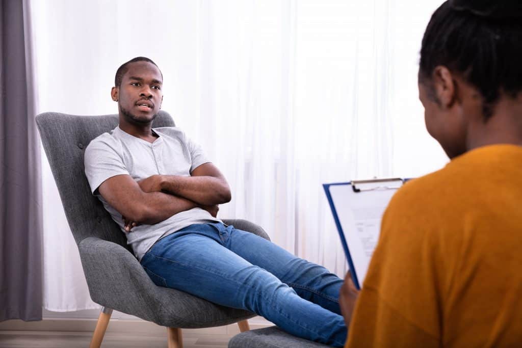 black-man-receiving-life-coaching-min-1024x683